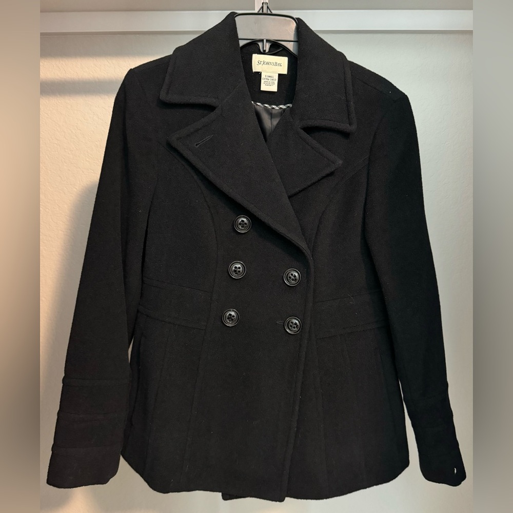 Like new St. John’s bay black peacoat size XS.